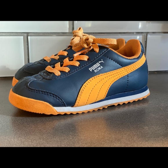 blue and orange puma shoes